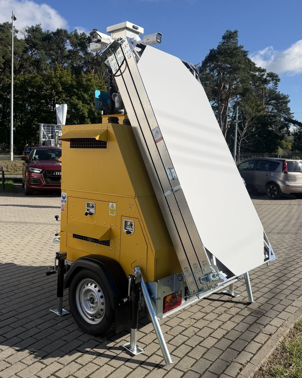 The tower folded onto the trailer, in transport position